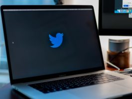 twitter bans account qanon conspiracy theory