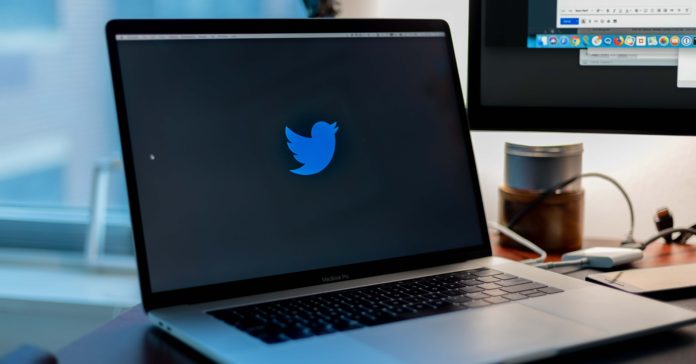 twitter bans account qanon conspiracy theory