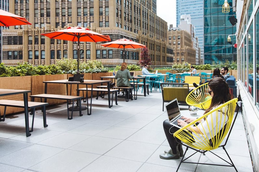 The terrace at WeWork 1460 Broadway in New York City offers a welcome change of pace—and space—for employees looking to get some sun.